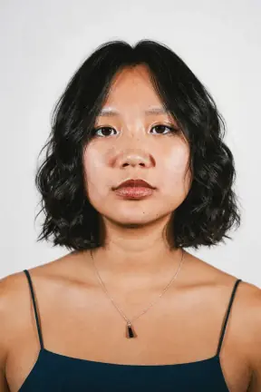 Straight shoulder-length layers to a wavy chin-length bob restyled