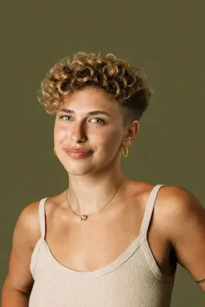 Voluminous curls to a tapered curly undercut restyled