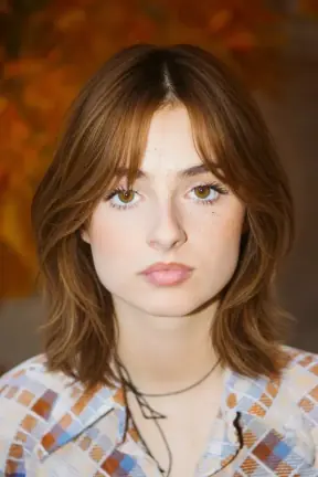 Flat mid-length hair to a layered shag with curtain bangs restyled