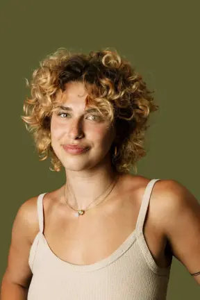 Voluminous curls to a tapered curly undercut